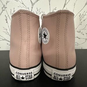 Pink leather CONVERSE high tops